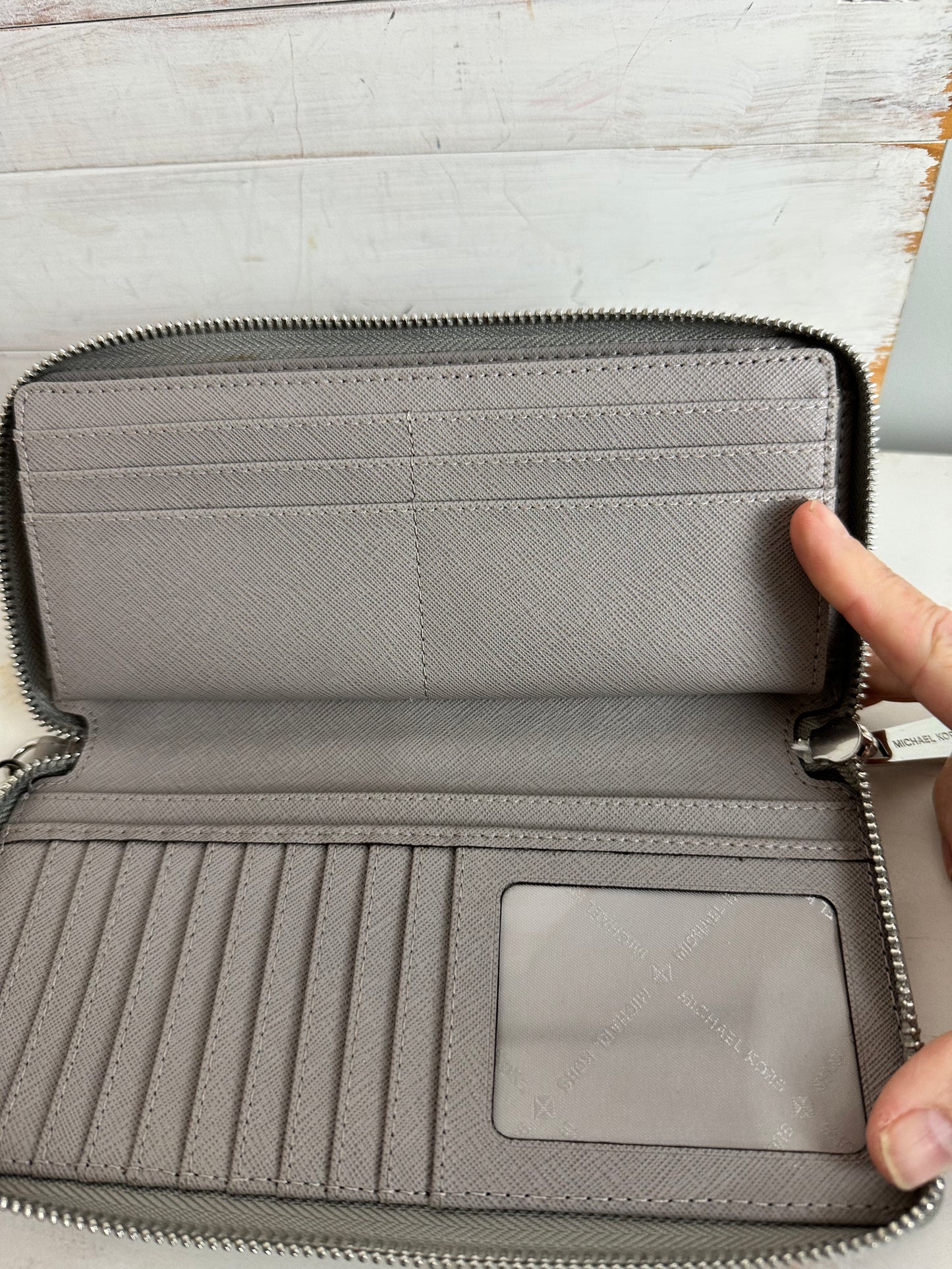Michael Kors Pebbled Leather Continental Wristlet in Gray