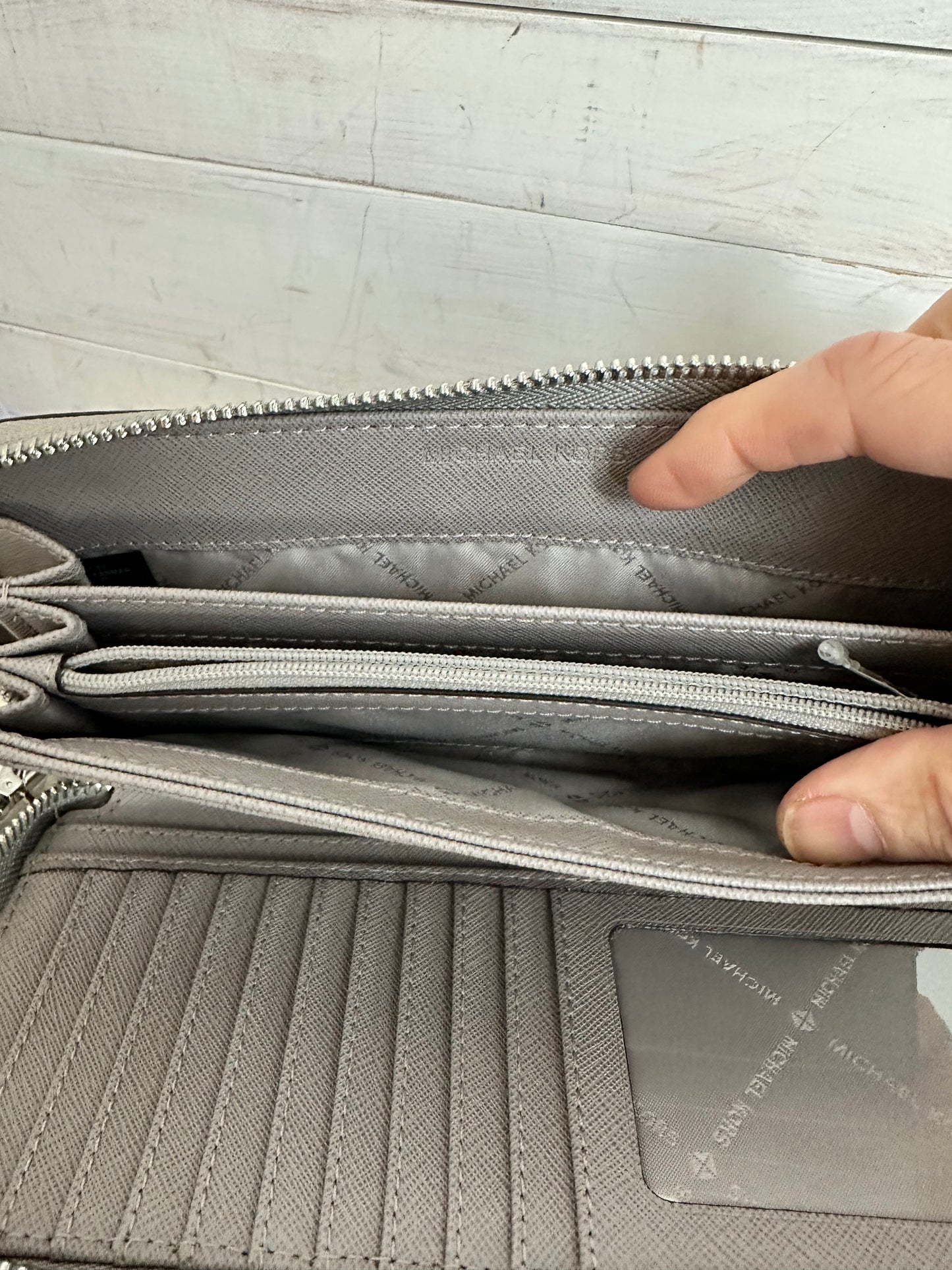Michael Kors Pebbled Leather Continental Wristlet in Gray