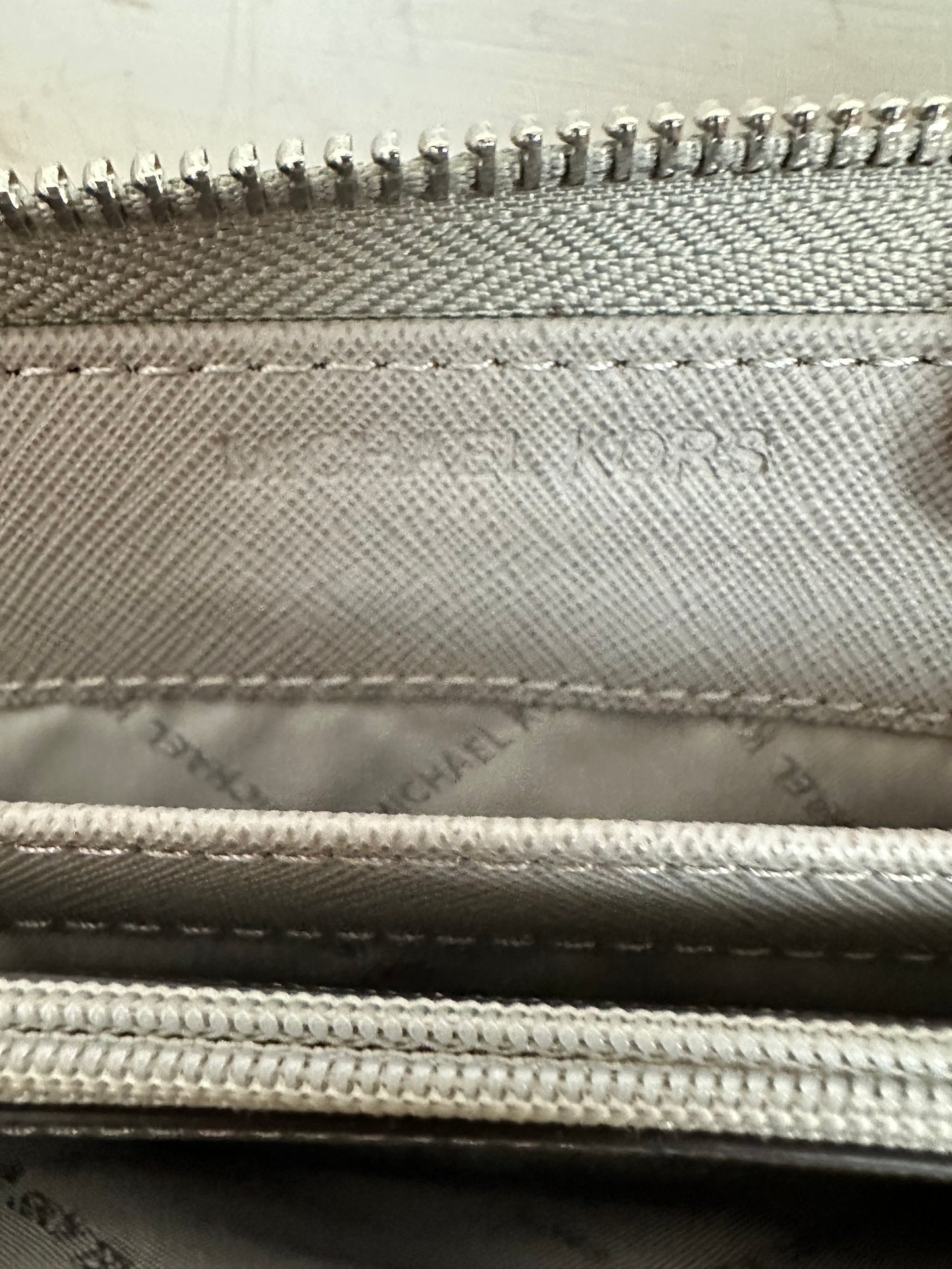 Michael Kors Pebbled Leather Continental Wristlet in Gray