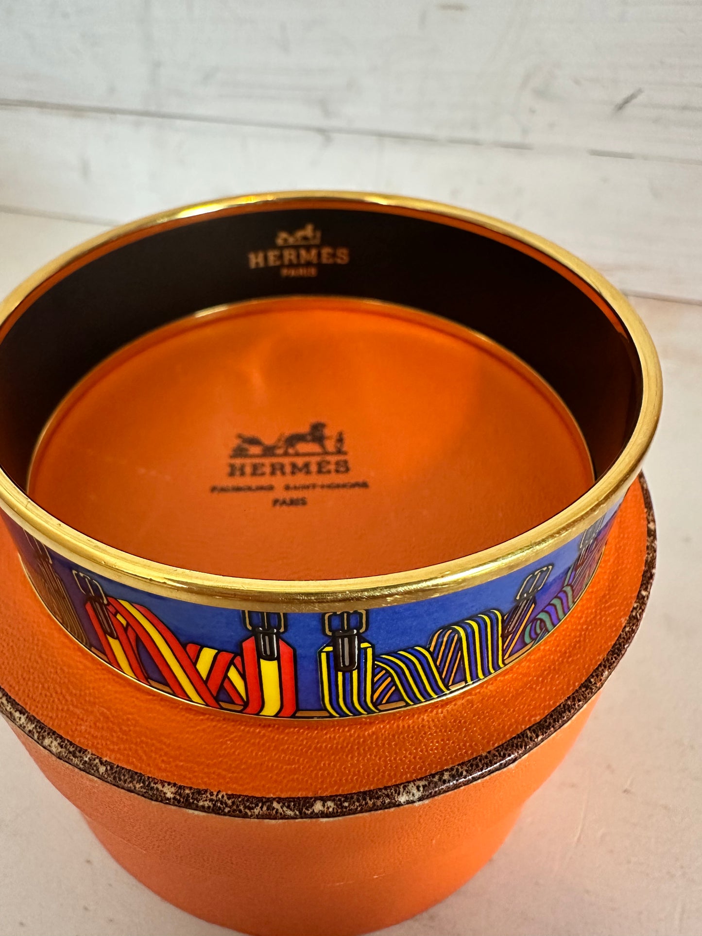 Hermes Les Sangles Cloisonne Bangle Blue and Multicolor trimmed in gold tone.