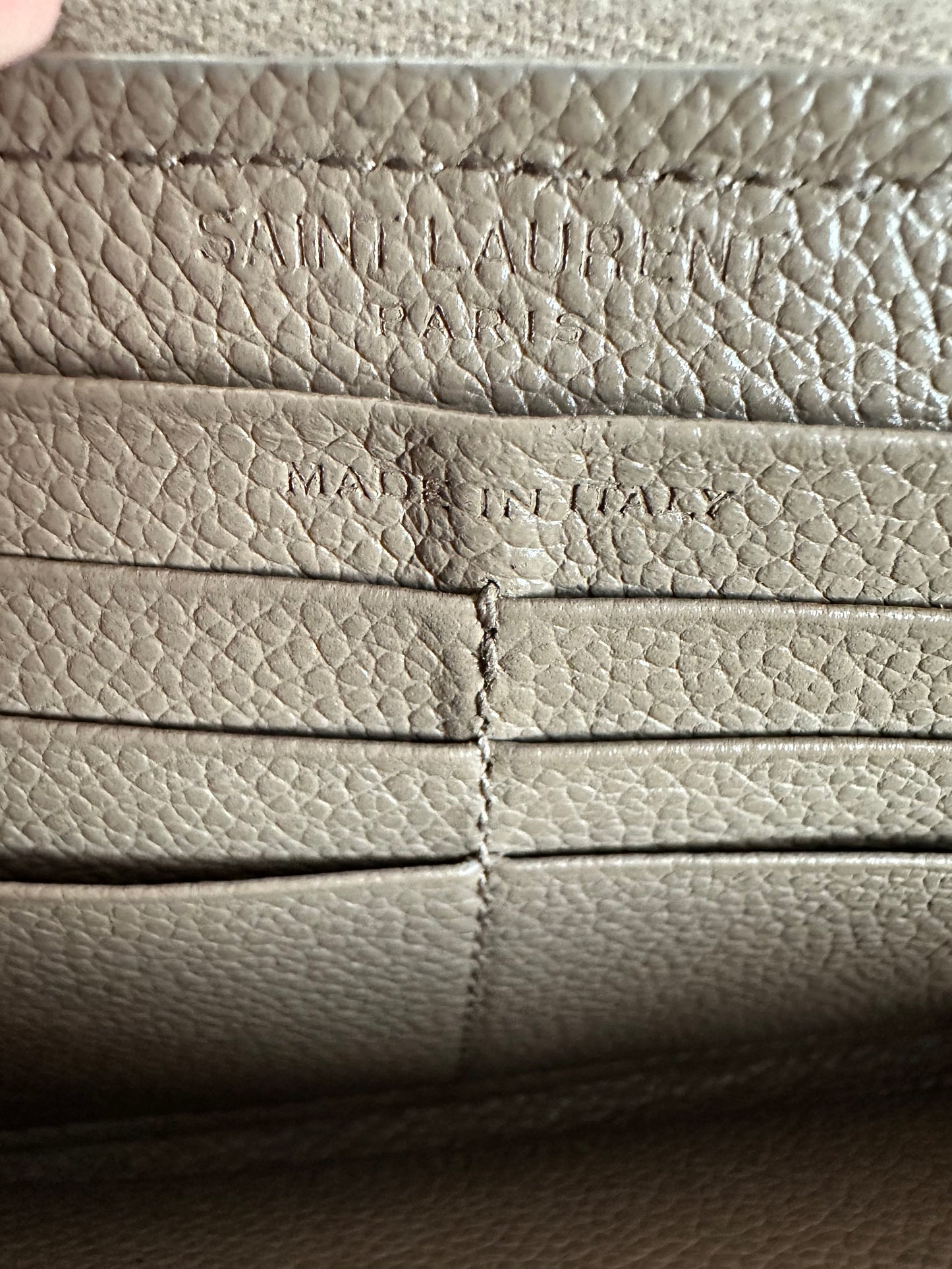 YVES SAINT LAURENT
Taupe Pebbled Leather Rive Gauche Zip Around Wallet