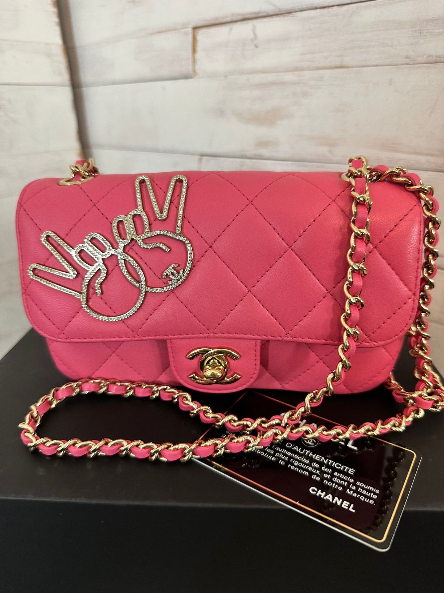 Chanel Pink Lambskin Extra Mini “V” Victory Bag