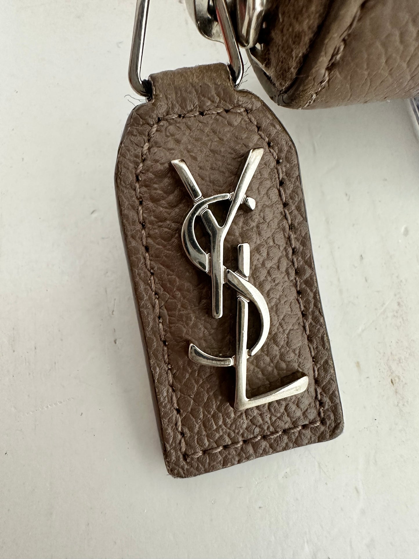 YVES SAINT LAURENT
Taupe Pebbled Leather Rive Gauche Zip Around Wallet
