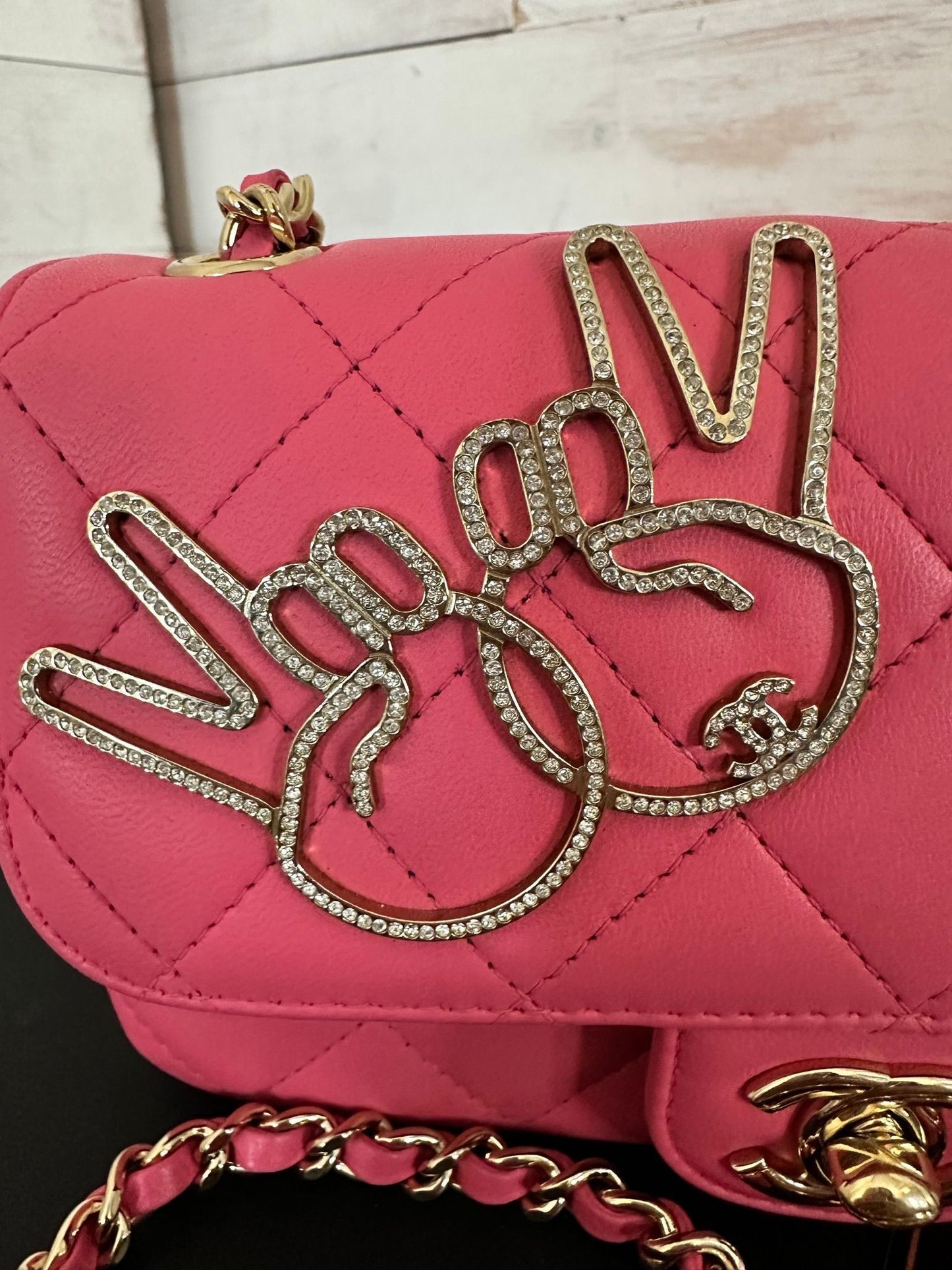 Chanel Pink Lambskin Extra Mini “V” Victory Bag